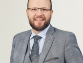 Янис Таукач